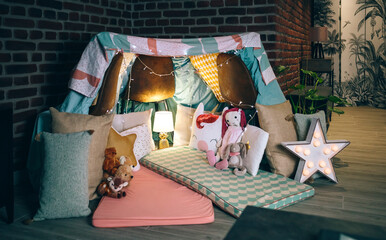 Diy tent decorated and prepared for pajama party