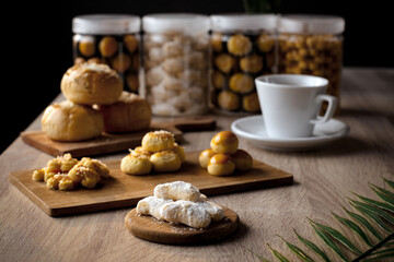 Assorted Indonesian cookies served on the wooden table