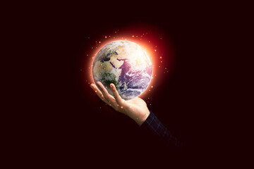 Hand holding planet for earth day and saving energy environment concept ,Element of this image from...