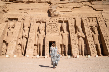 Female Traveler exploring Abu Simbel Temple in Egypt