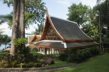 view of nice bali style  villa  in tropic environment      