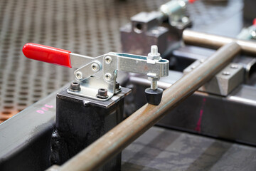 Toggle clamp for locking welding machine parts. For clamping workpieces and inspection JIGs.
