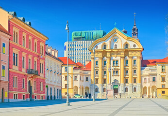 Fototapeta na wymiar View of Congress Square and the Ursuline Church of the Holy Trinity in the central part of Ljubljana, Slovenia