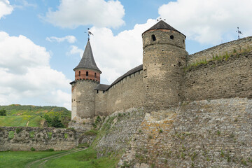 Fototapeta na wymiar Castle defensive towers in Kamianets-Podilskyi