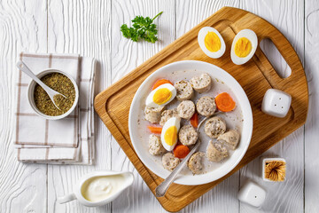 Zurek polish rye soup on a white wooden background