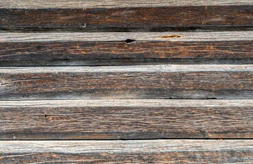Fototapeta premium Background from old wooden boards with an interesting texture. Textured wood pattern. Photos of boards fitted to each other.