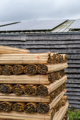 Stack of hand cleft plastering laths