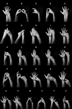 B+W image of hands demonstrating BSL sign language alphabet letters A-Z with text labels isolated against black background
