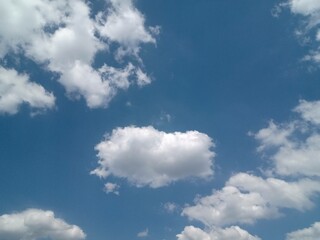Naklejka na ściany i meble clouds blue sky tranquility watching firmament White brillant thought to fly gratitude