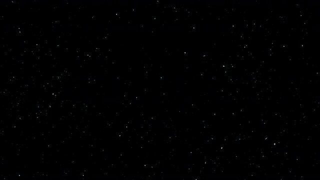 4k time lapse animation of the starry sky with falling meteors.