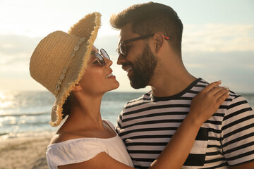 Lovely couple spending time together on beach © New Africa