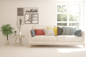 White living room with sofa and summer landscape in window. Scandinavian interior design. 3D illustration