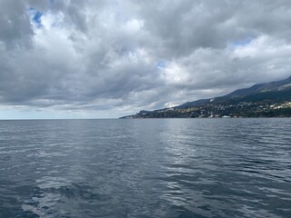 view of the Black Sea coast in cloudy weather from the ship