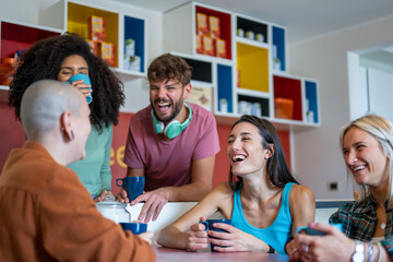 young people having fun in hostel living room, digital nomads lifestyle