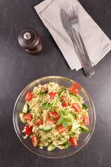 bowl of vegetable salad with semolina or pasta