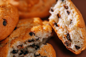 chocolate chip cookies close-up on brown background