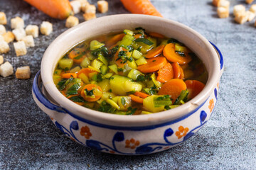 Minestrone soup with croutons, detox food for a light and healthy dinner. Ideal dish for a vegan diet.