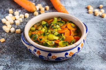 Minestrone soup with croutons, detox food for a light and healthy dinner. Ideal dish for a vegan...