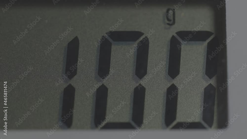 Poster electronic scales display showing one hundred grams