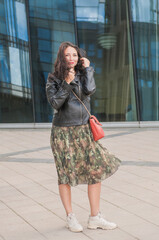 Beautiful young fashion happy woman with flying hair