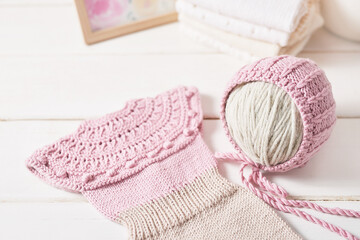 Knitted kids clothes and accessories for knitting. Needlework and knitting. Hobbies and creativity....