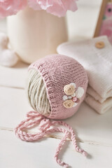 Knitted kids clothes and accessories for knitting. Needlework and knitting. Hobbies and creativity. Knit for children. Handmade