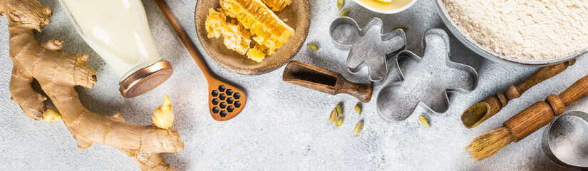 Christmas banner. Christmas Baking background. Ingredients for cooking christmas baking on light background. Top view with copy space. Gingerbread cookies. Baking Ginger cookies. Raw dought