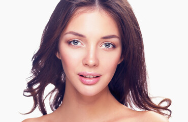 Fototapeta premium Close up portrait of beautiful young woman face. Isolated on white background.