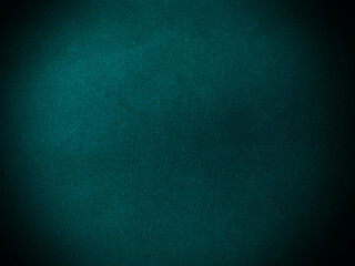 Dark  green velvet fabric texture used as background. Empty green fabric background of soft and smooth textile material. There is space for text...