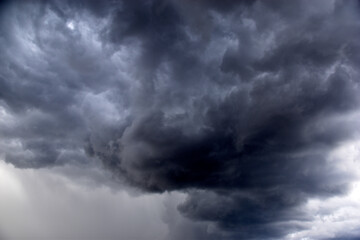 Obraz premium Blue and white cumulus storm clouds thunderstorm landscape