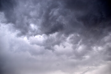 Blue and white cumulus storm clouds thunderstorm landscape