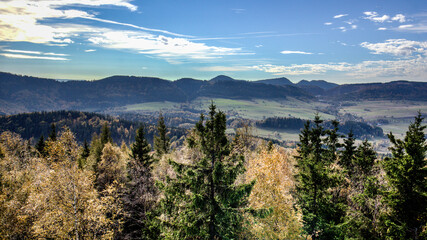 windy clouds against the backdrop of a mountain landscape