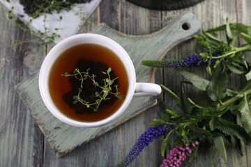 Black tea brew and fresh lemon thyme