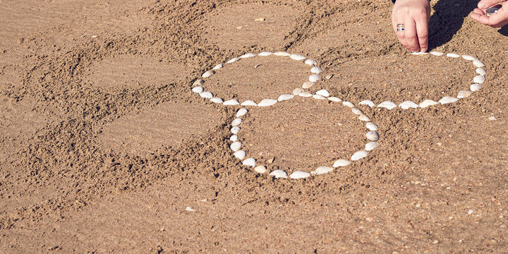 Drawing on a sandy beach.