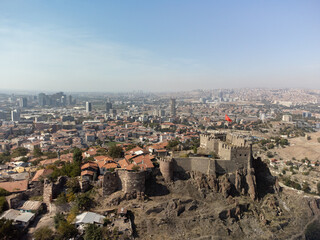 Fototapeta na wymiar Aerial view on ancient Ankara fortress with Turkish flag