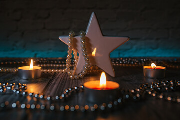 christmas lights and candles decoration, blur background
