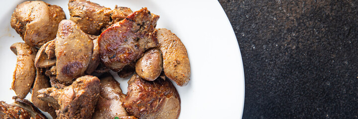 chicken liver fried or stewed fresh offal portion ready to eat meal snack on the table copy space food background rustic. top view keto or paleo diet
