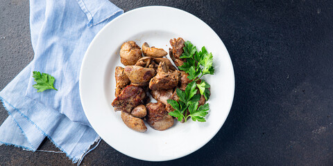 chicken liver fried or stewed fresh offal portion ready to eat meal snack on the table copy space food background rustic. top view keto or paleo diet