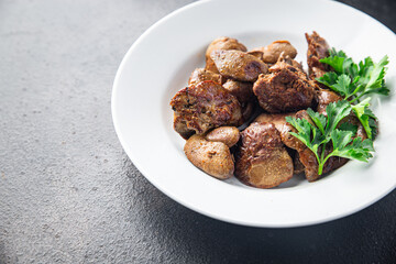 chicken liver fried or stewed fresh offal portion ready to eat meal snack on the table copy space food background rustic. top view keto or paleo diet