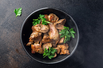 chicken liver fried or stewed fresh offal portion ready to eat meal snack on the table copy space food background rustic. top view keto or paleo diet