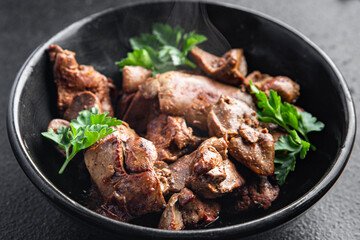 chicken liver fried or stewed fresh offal portion ready to eat meal snack on the table copy space food background rustic. top view keto or paleo diet