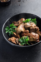 chicken liver fried or stewed fresh offal portion ready to eat meal snack on the table copy space food background rustic. top view keto or paleo diet