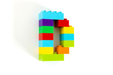 Colorful toy brick letter D