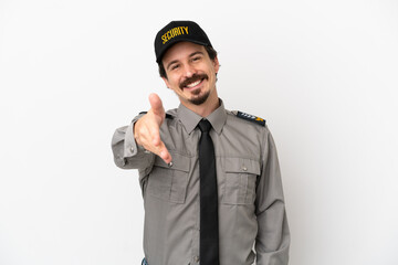 Young caucasian security man isolated on white background shaking hands for closing a good deal