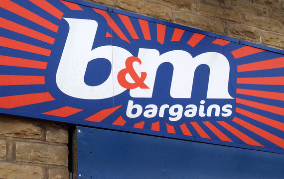 halifax, west yorkshire, united kingdom - 18 August 2021: sign above a b and m bargains discount store in halifax town centre