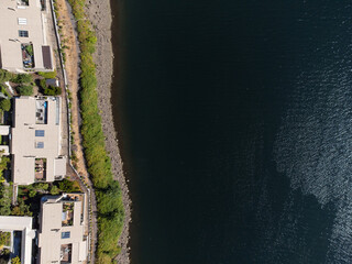 Beautiful majestic landscape. Dark blue river and coastal area. Greens. Calm scenes. There are no...