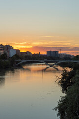 Fototapeta na wymiar view of the sunset from the bridge over the ebro river