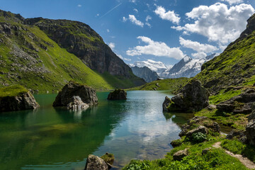 Superbly scenic Lac de Louvie, an alpine lake just above Fionnay village in the canton of Valais,...