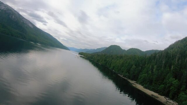 View from airplane on the flying floatplane over the lake. Alaska