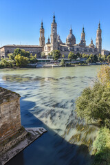 Fototapeta premium Zaragoza, Spain - 23 Oct, 2021:Basilica of Our Lady of the Pillar and the River Ebro, Zaragoza, Aragon, Spain